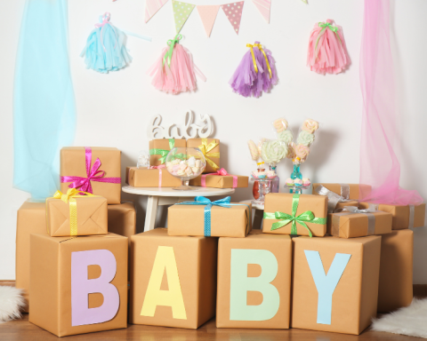 photo of a baby shower with boxes that spell out the word Baby